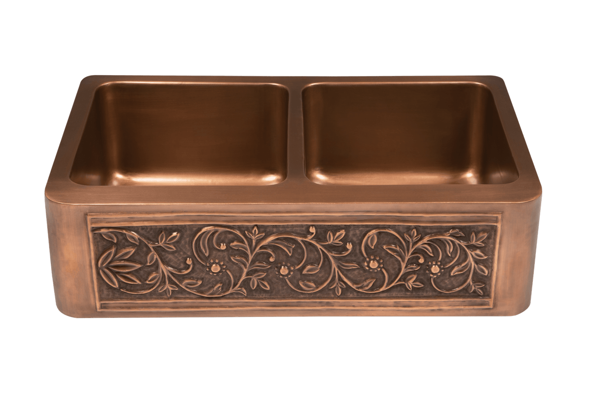 Copper Country Double Sink - 838mm by Savile Row - copper double bowl farmhouse sink - Angled high view - double bowl copper farmhouse sink with embossed floral apron